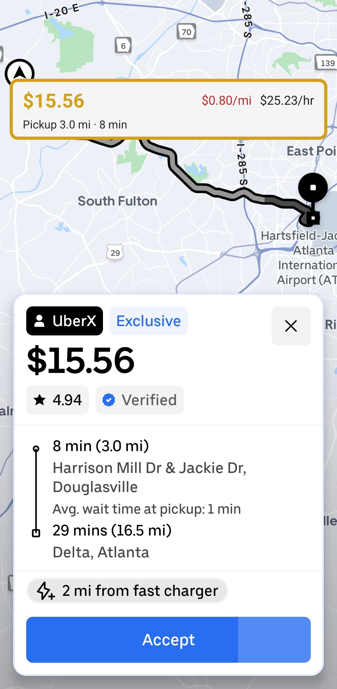 DriveLens overlay grading an Uber offer yellow, showing $15.56 payout at $0.80/mi and $25.23/hr